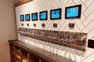 PourMyBeer self-pour beverage wall at Auto Pour