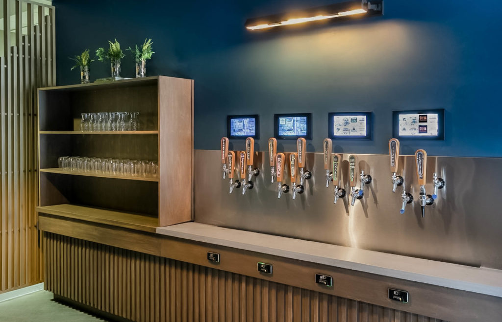 PourMyBeer self-pour beverage wall in hotel