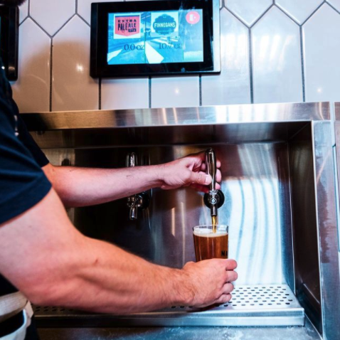 Malcolm Yards pouring at self-pour wall